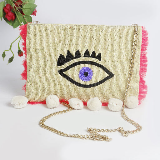 CrÃ¨me Evil Eye Sling Bag by Sole House - Local Option